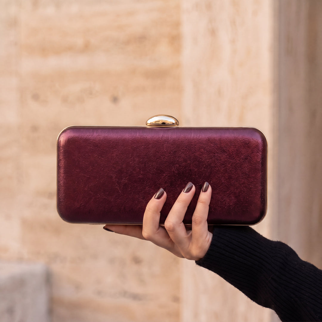 Serata Clutch Bag - Burgundy, in hand